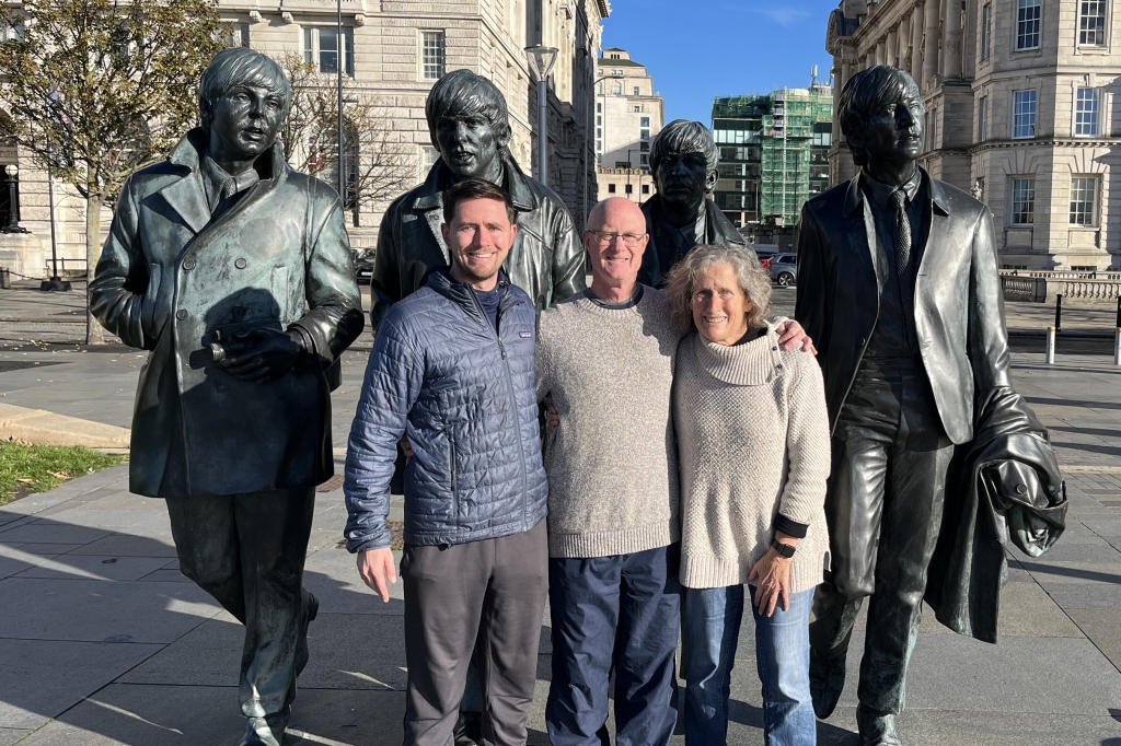 photo of Jordan, Mark, and Jo Anne with Beatles statue